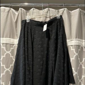 Great little go anywhere skirt.  Length is 24” from waistband